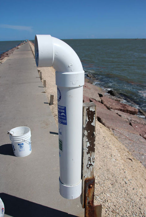 This is a monofilament bin located on the Surfside Jetty. You can recycle your fishing line in bins like this one. 