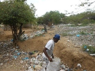 Cleaning up plastic trash to make the Titi posts.