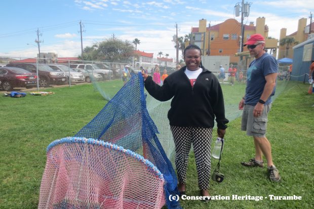 Valerie with a shrimp net and the turtle excluder device.