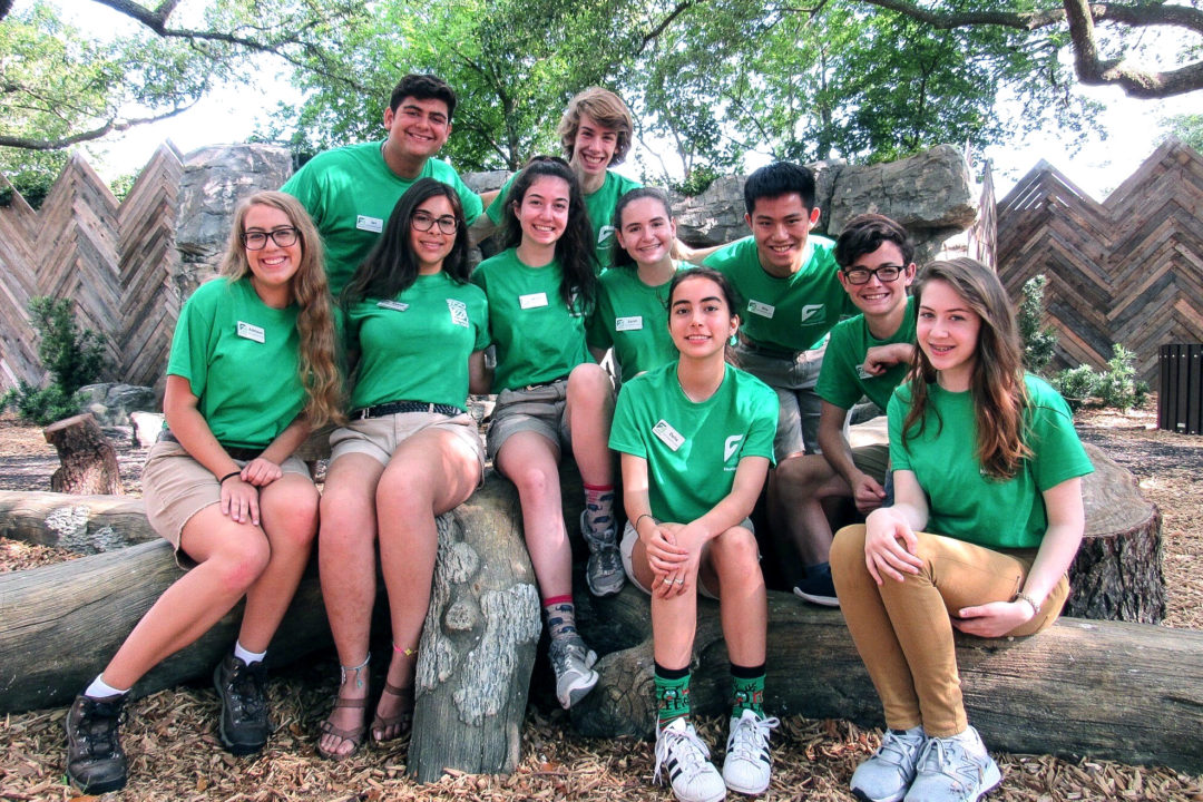 Zoo Crew teens posing in explore the wild habitat