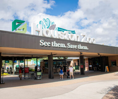 Photo of Zoo's main entrance with Centennial signage